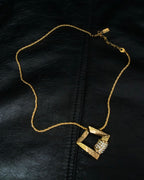 "YVES SAINT LAURENT" rhinestone motif gold necklace
