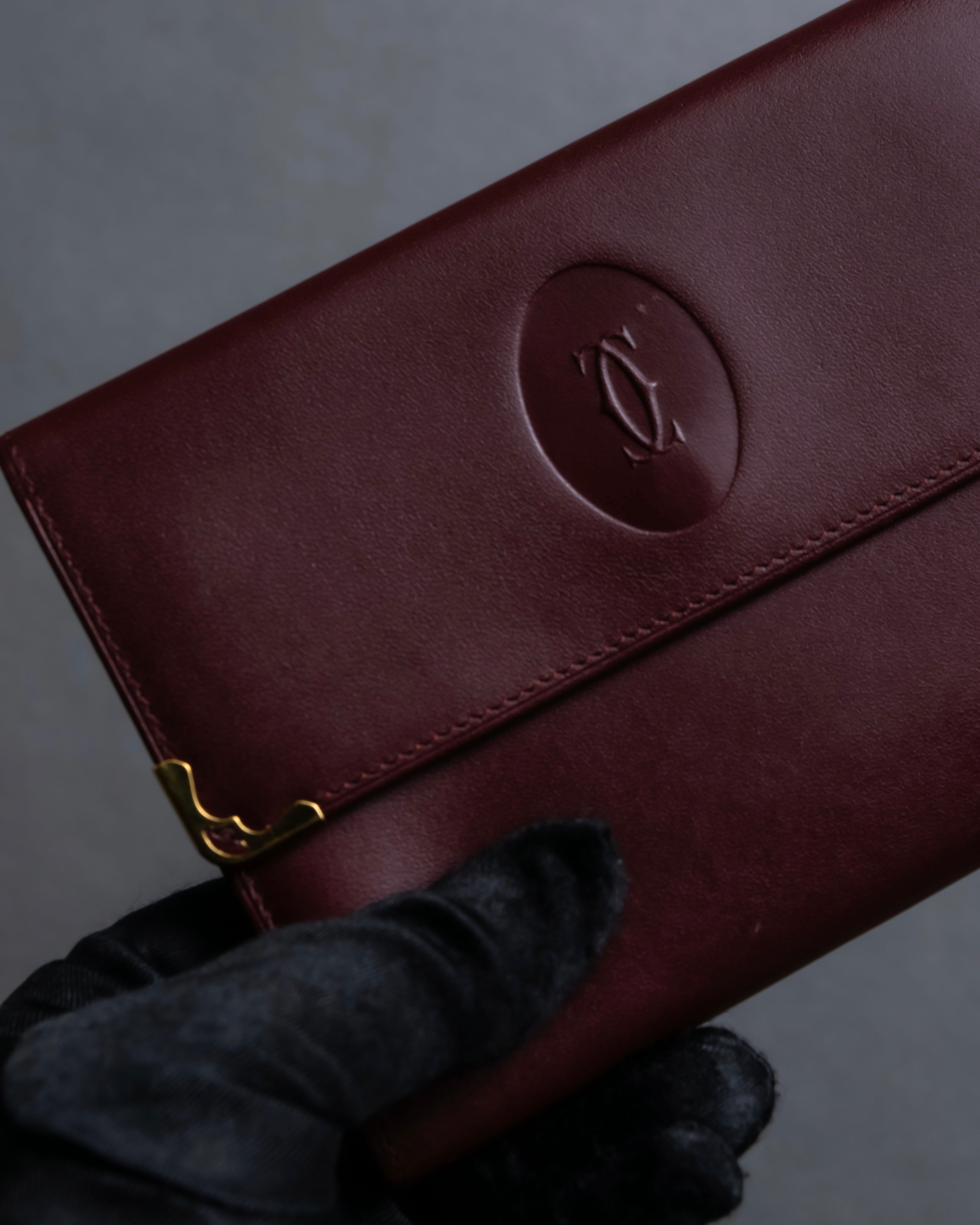 "Cartier" Les Must de Cartier bordeaux color leather wallet