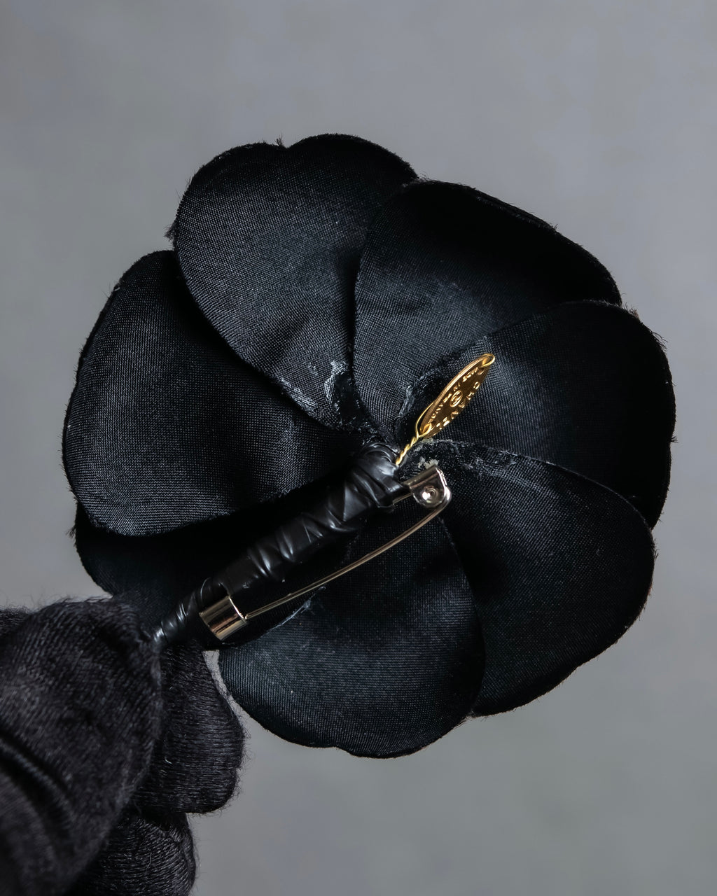 "CHANEL" Black camellia motif brooch