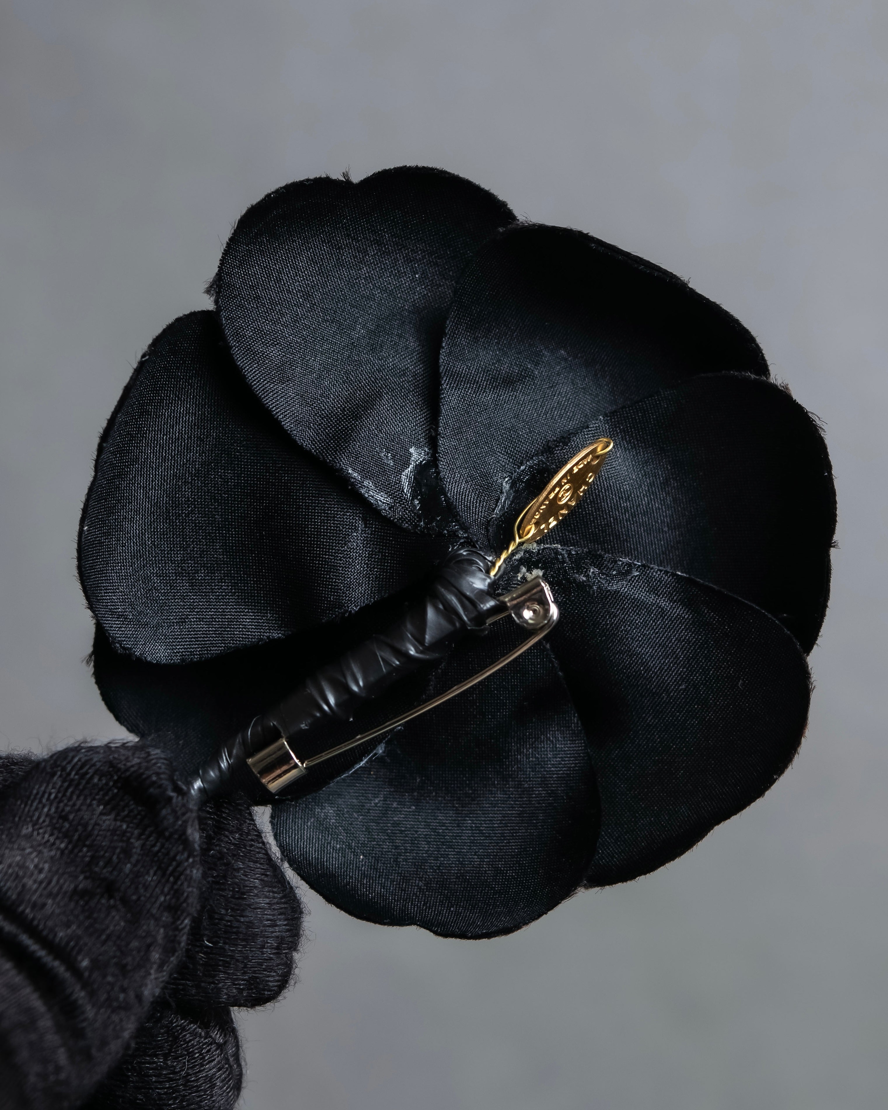 "CHANEL" Black camellia motif brooch