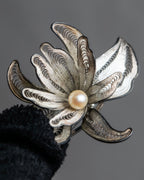 "Vintage petal motif broach"