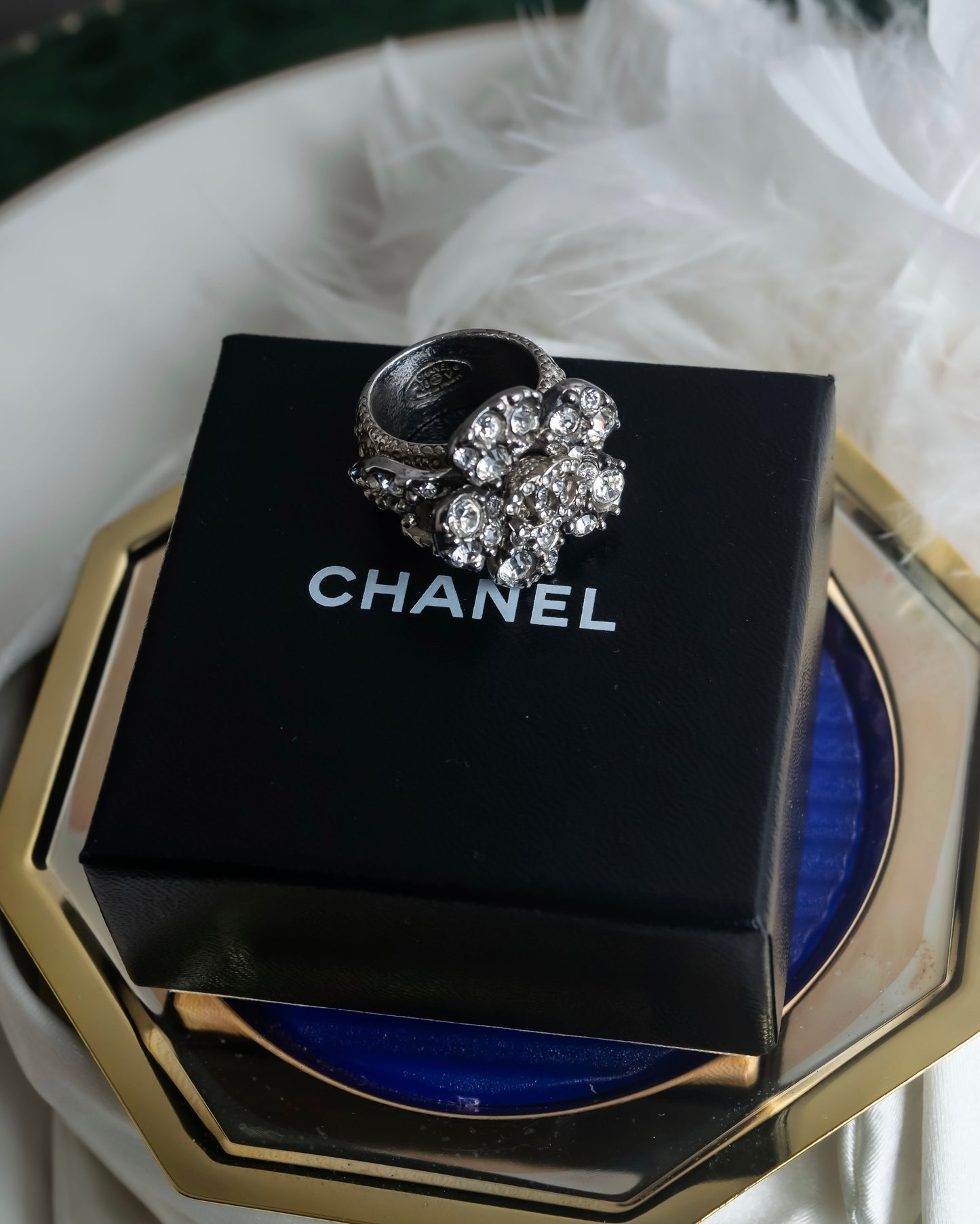 "CHANEL" Cocomark engraved rhinestone design camellia ring