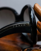 "PRADA" Logo engraved black round frame sunglasses