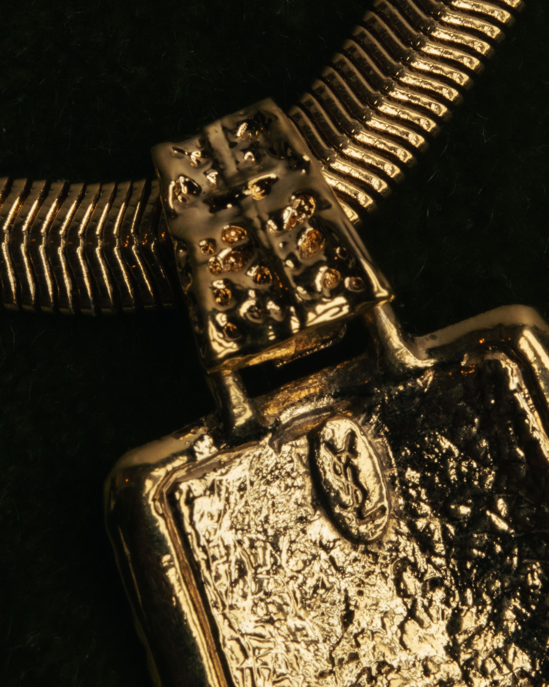 "Yves Saint Laurent" 80's-00's Gold tone textured pendant necklace