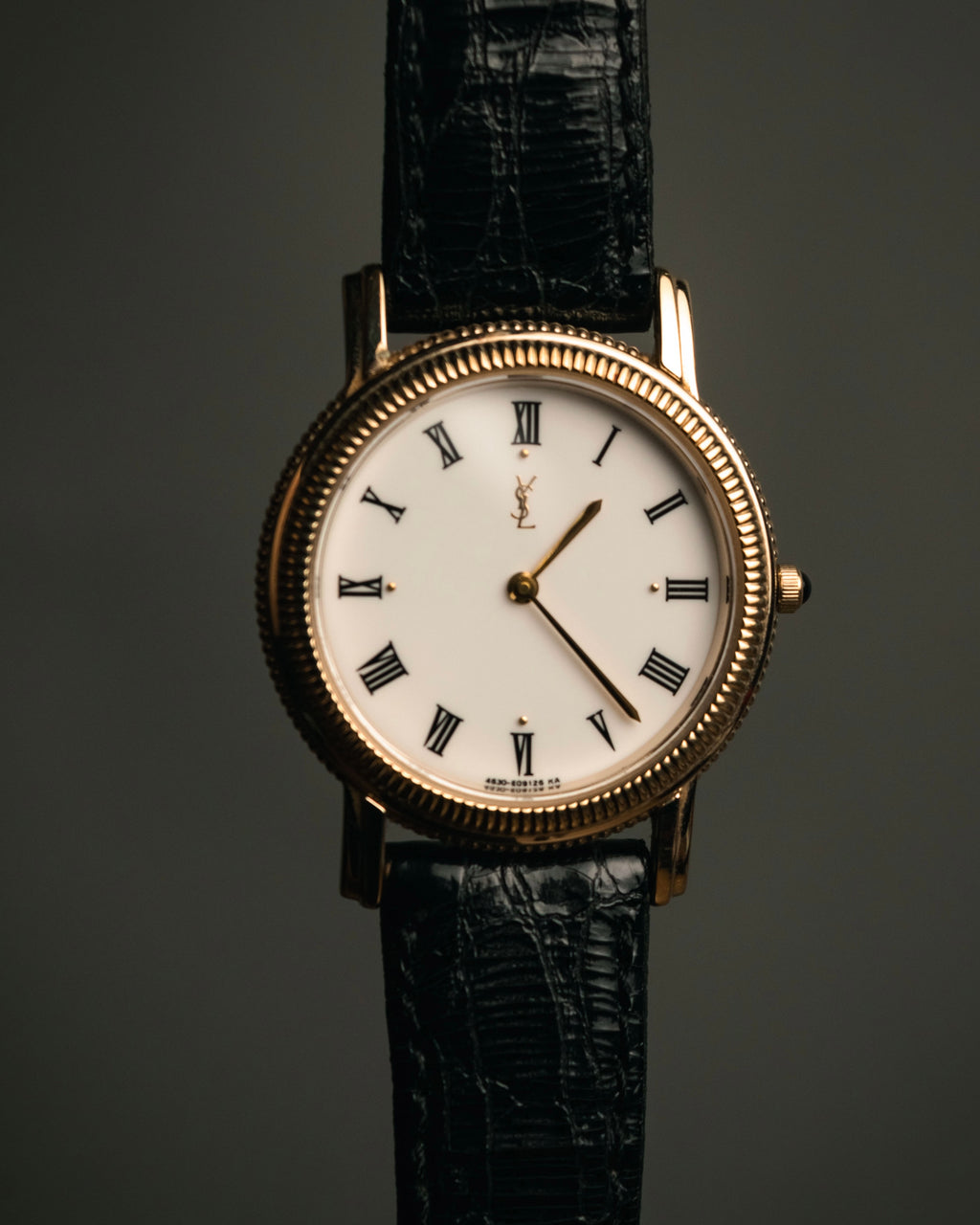 “Yves Saint Laurent” 80’s-90’s coin edge quartz leather watch