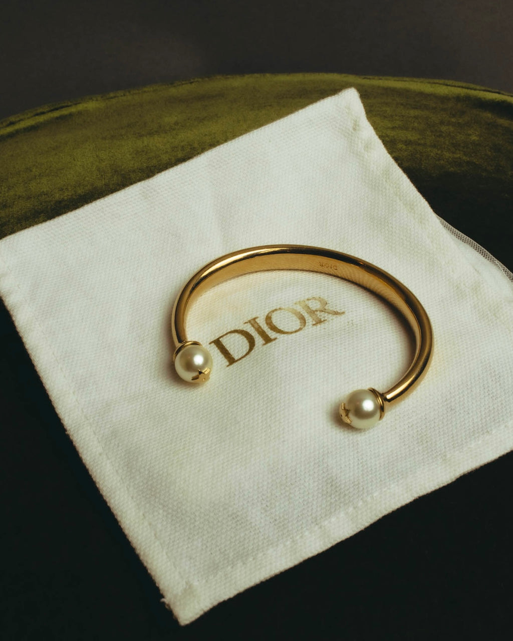 "DIOR" 10's-20's Gold tone pearl star open bangle
