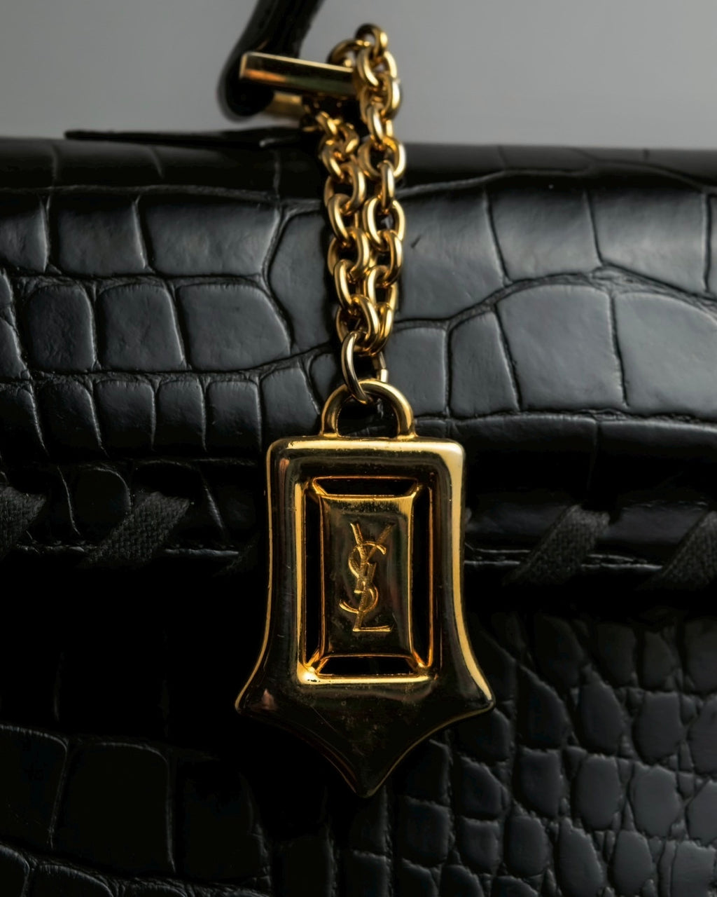 "YVES SAINT LAURENT" Whip stitch design crocodile foil stamped leather hand bag