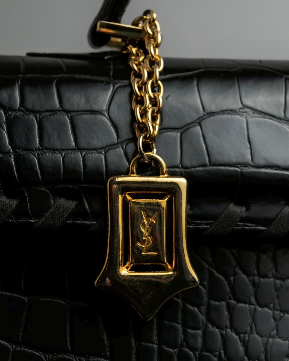 "YVES SAINT LAURENT" Whip stitch design crocodile foil stamped leather hand bag