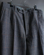 Pantalones vintage con detalle de botones, ventana de estampado a cuadros