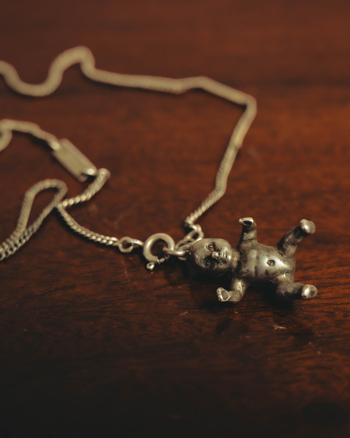 "Saint Laurent" 10's-20's Sculptural doll pendant necklace