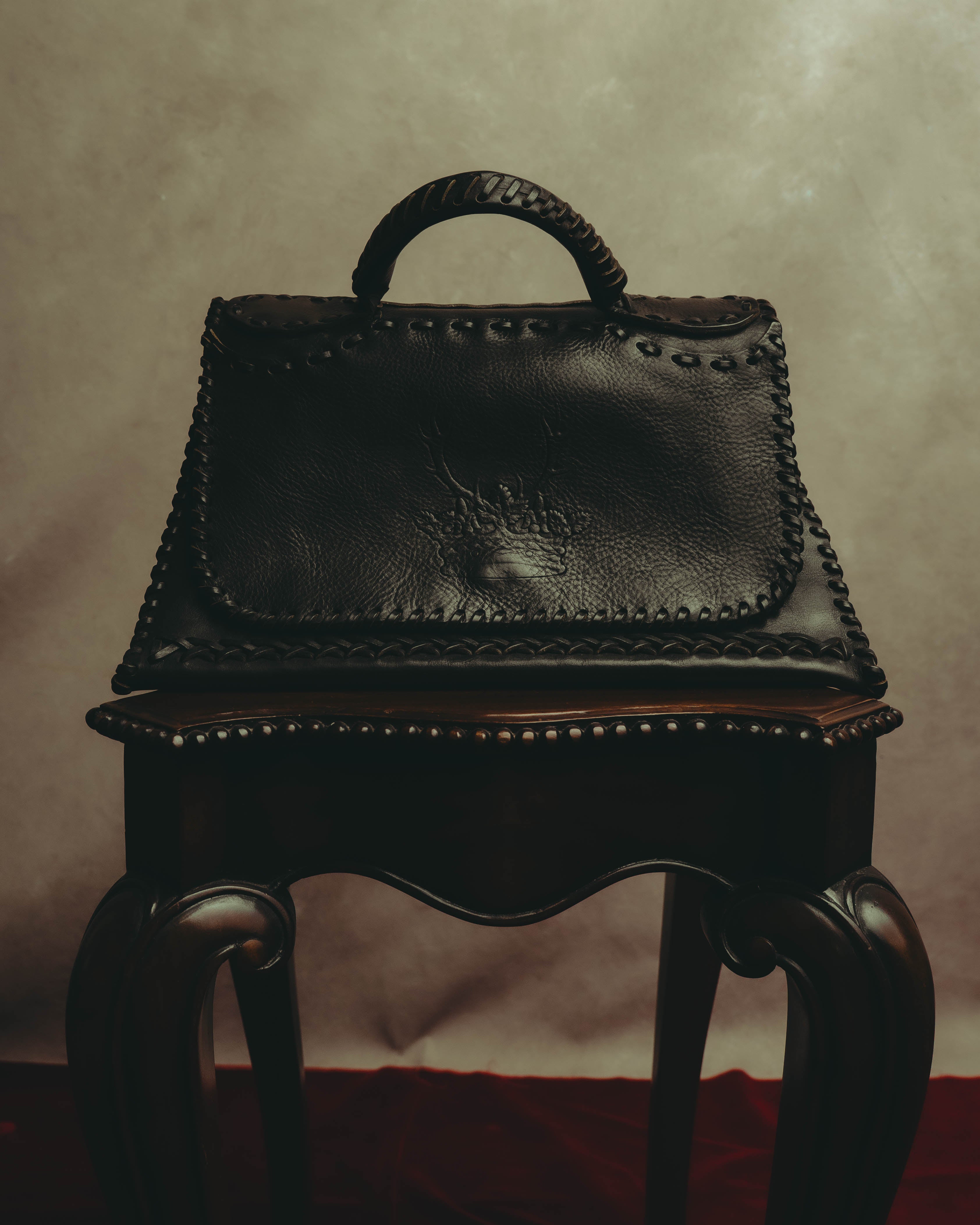 -SPECIAL- “FENDI” 80’s-90’s Coat of arms embossed whipstitched leather handbag