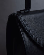 "YVES SAINT LAURENT" Hand stitched design trapezoid leather bag