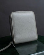 "MAISON MARGIELA" White grain leather round zipper wallet