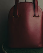 "Cartier" 80's-90's Bordeaux leather handbag