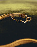 "Christian Dior" Gold tone braided knot costume jewelry necklace