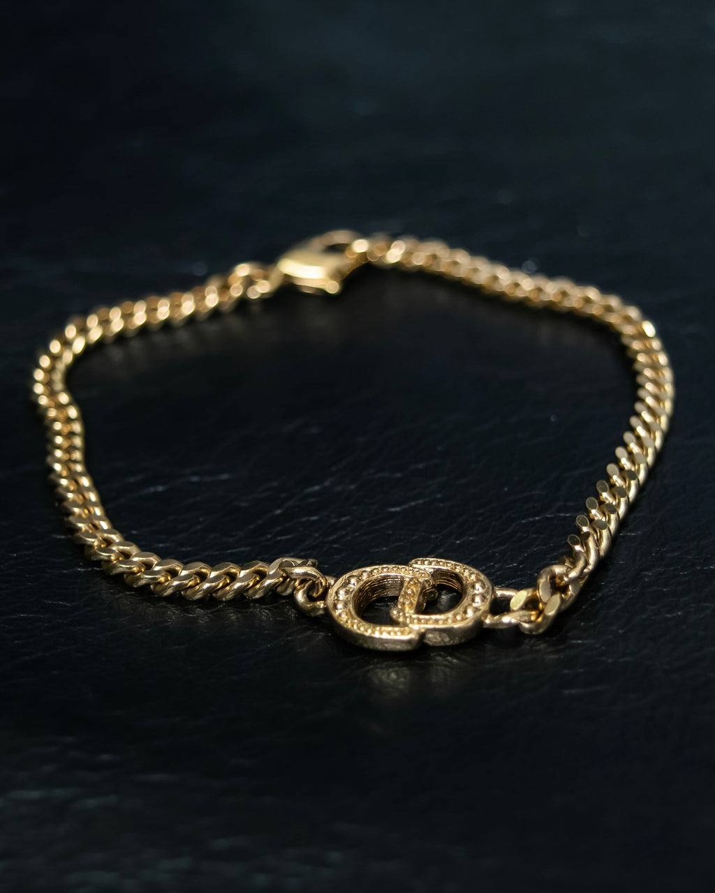 “Christian Dior” CD motif gold chain bracelet