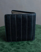 "CHANEL" Mademoiselle line design coco mark engraved bi fold wallet