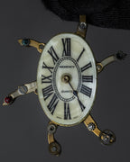 "Jerry Robertson design clock motif brooch"