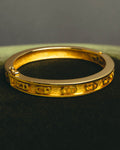 “Christian Dior” 80’s-90’s CD monogram gold tone bangle
