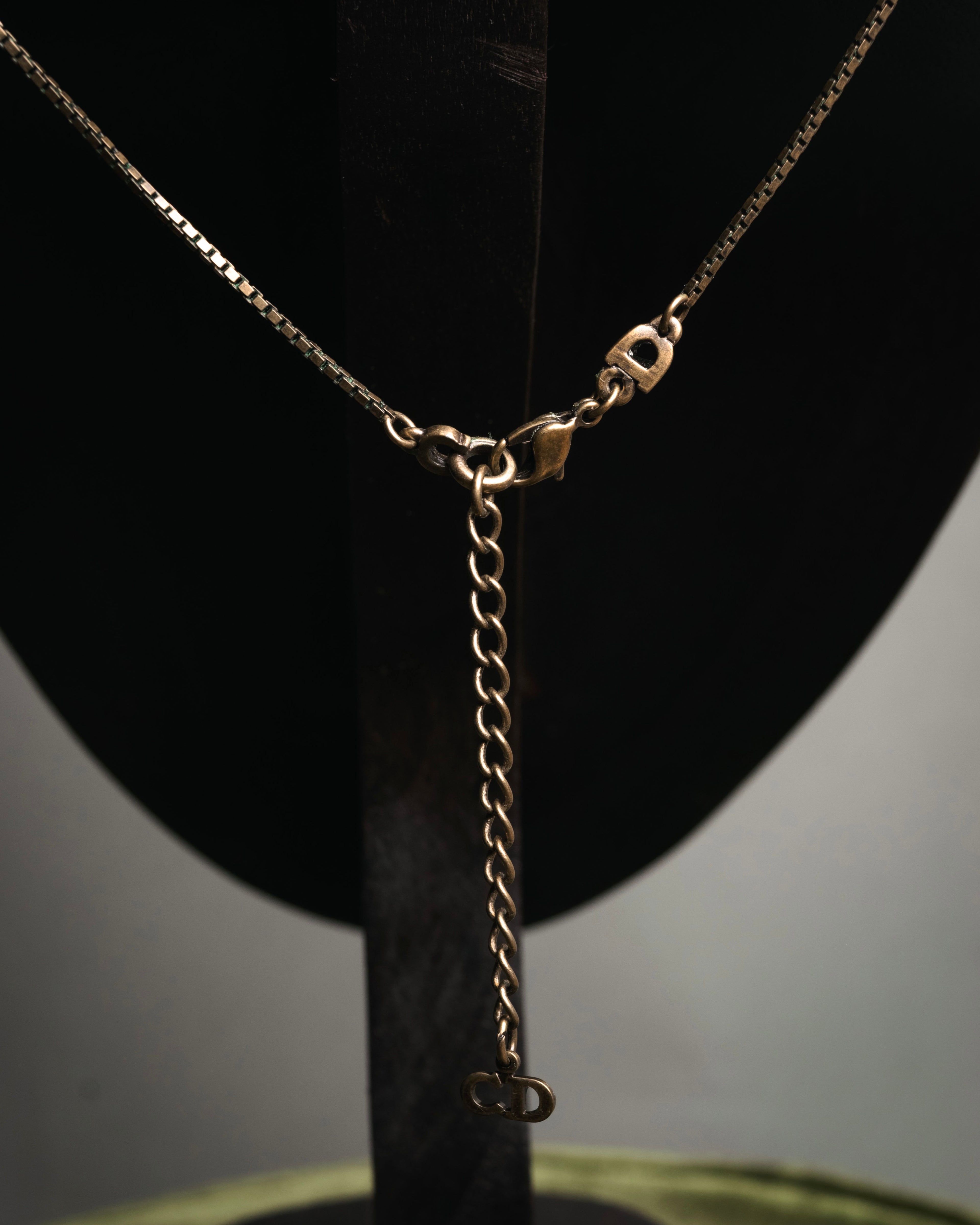 “Christian Dior” 90’s-00’s Antique gold botanical pendant necklace