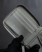 "MAISON MARGIELA" White grain leather round zipper wallet