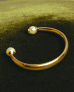 "DIOR" 10's-20's Gold tone pearl star open bangle