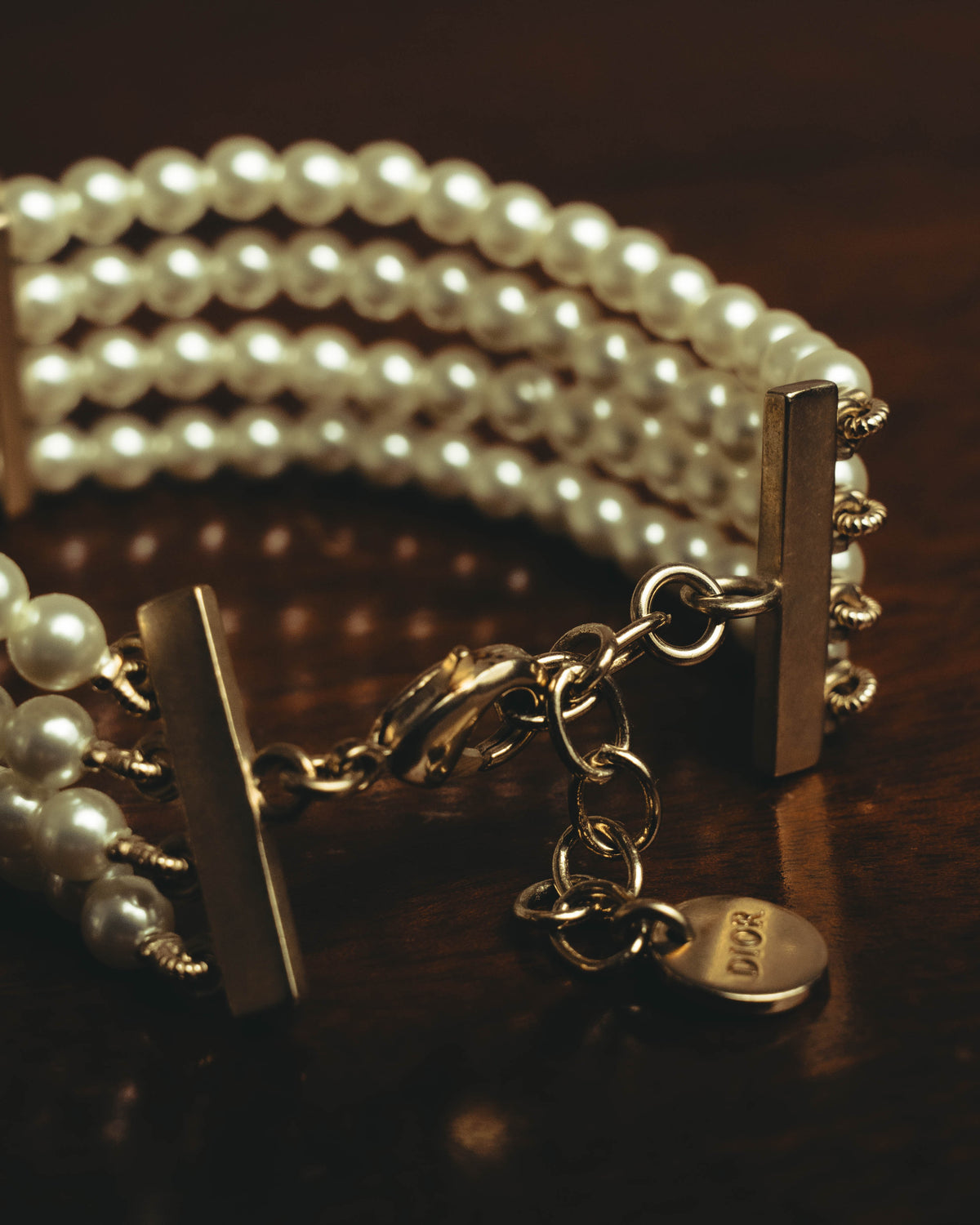 –SPECIAL– “Christian Dior” 2018-2025 Four-strand faux pearl bracelet with sculptural oval accents