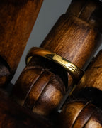 "Alexandar McQueen" Horseshoe motif red stone top ring