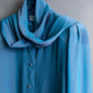 "PIERRE BALMAIN" Beautiful light blue color sheer bowtie blouse