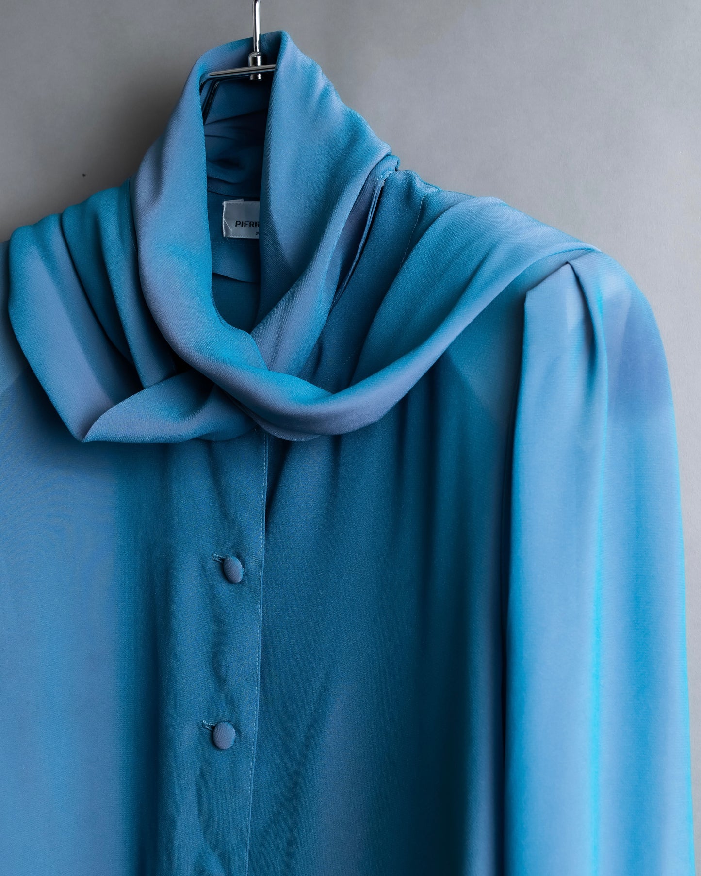 "PIERRE BALMAIN" Beautiful light blue color sheer bowtie blouse