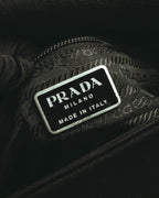 “PRADA” 90’s-00’s Nylon and leather flap messenger bag