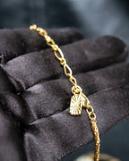 "YVES SAINT LAURENT" rhinestone motif gold necklace