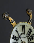 "Jerry Robertson design clock motif brooch"