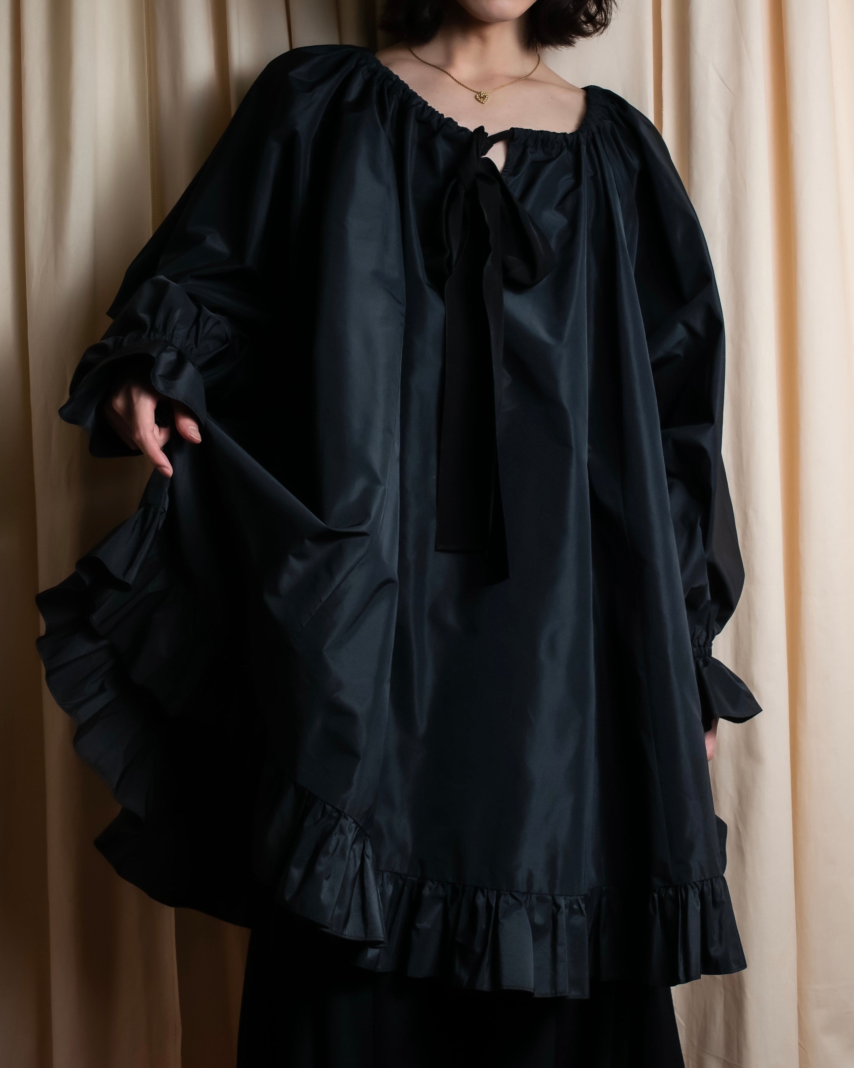 PATOU - Ribbon Shirred Poncho Dress - Black - Size 36 - Long Sleeves, Ruffled Hem, A-Line MOOD PATOU - Ribbon Shirred Poncho Dress - Black - Size 36 - Long Sleeves, Ruffled Hem, A-Line MOOD