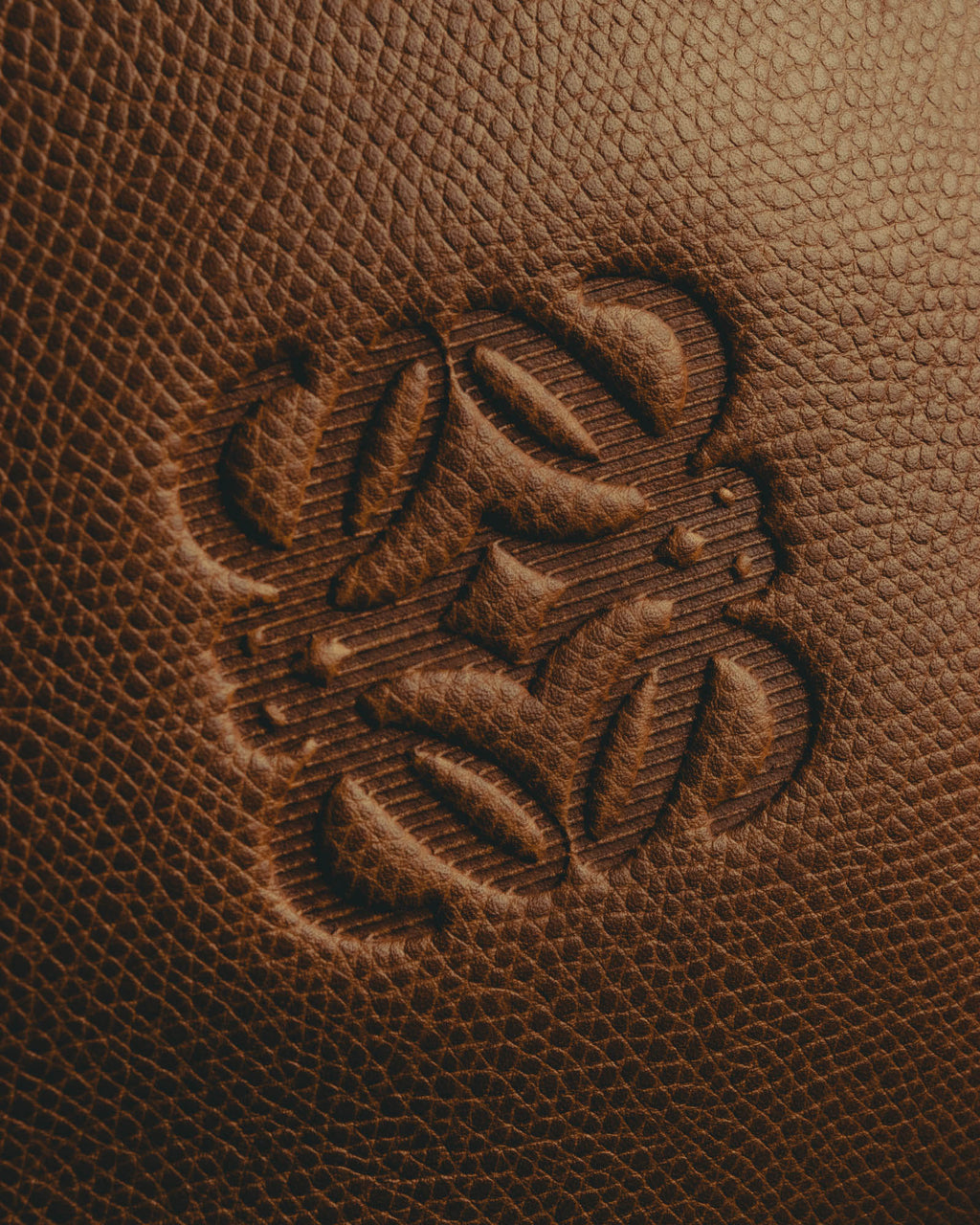 "LOEWE" 80s–00's logo embossed leather handbag