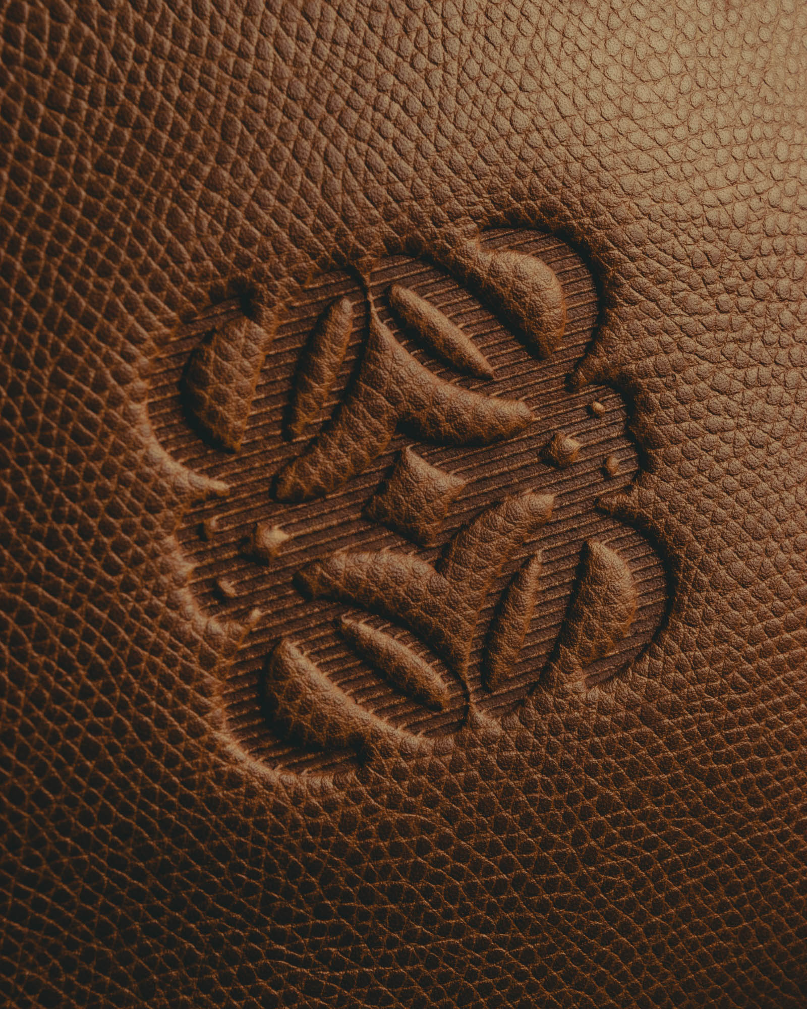 "LOEWE" 80s–00's logo embossed leather handbag
