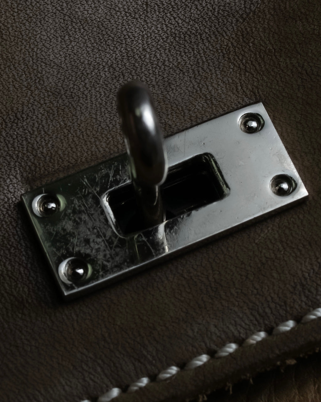 "Mademoiselle Accessories"
 Silver parts design leather one handle bag