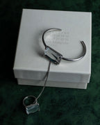"Maison Martin Margiela" Crystal cut head motif ring＆bangle combination set