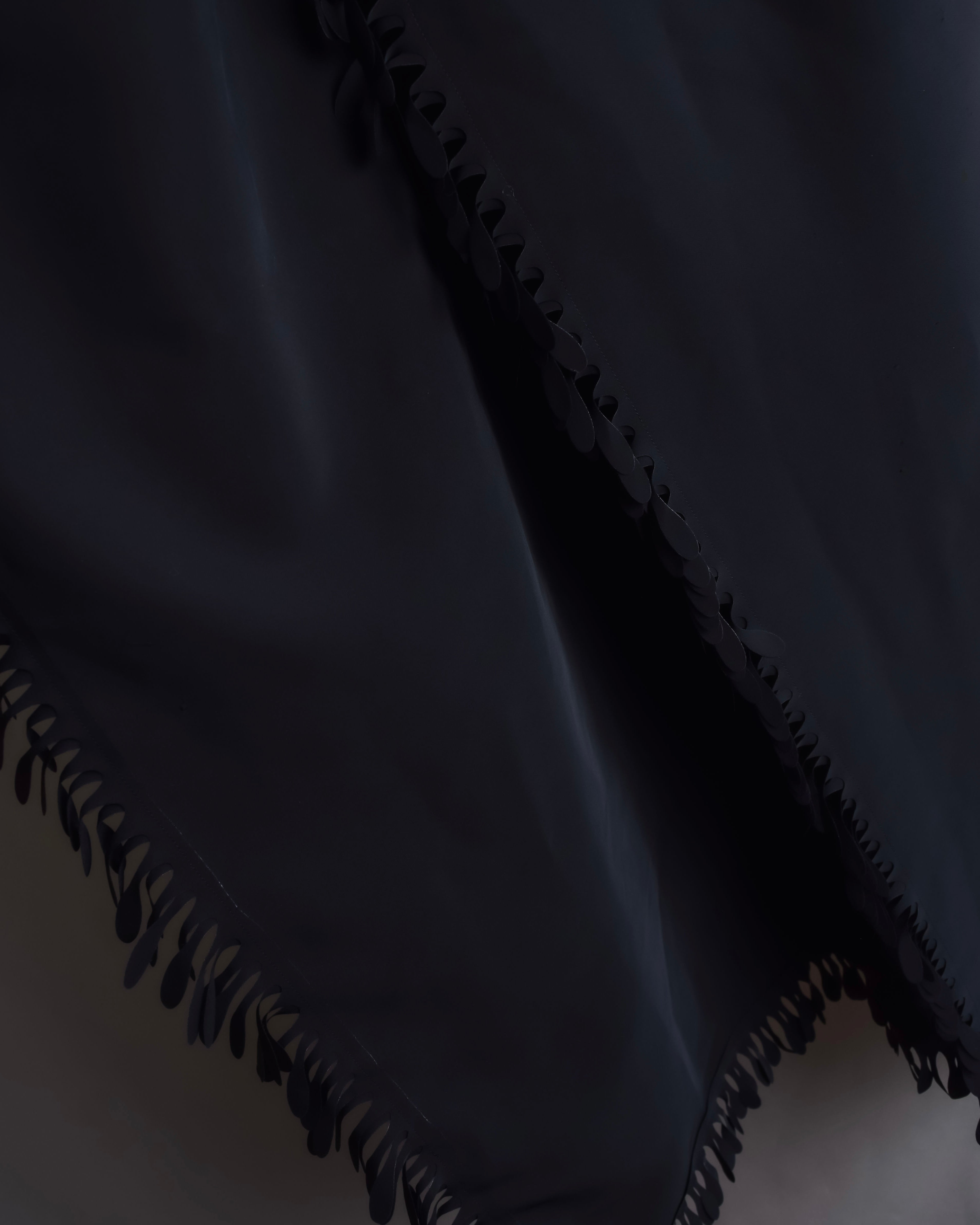 "ISSEY MIYAKE" Organic cutout fringe wrap skirt