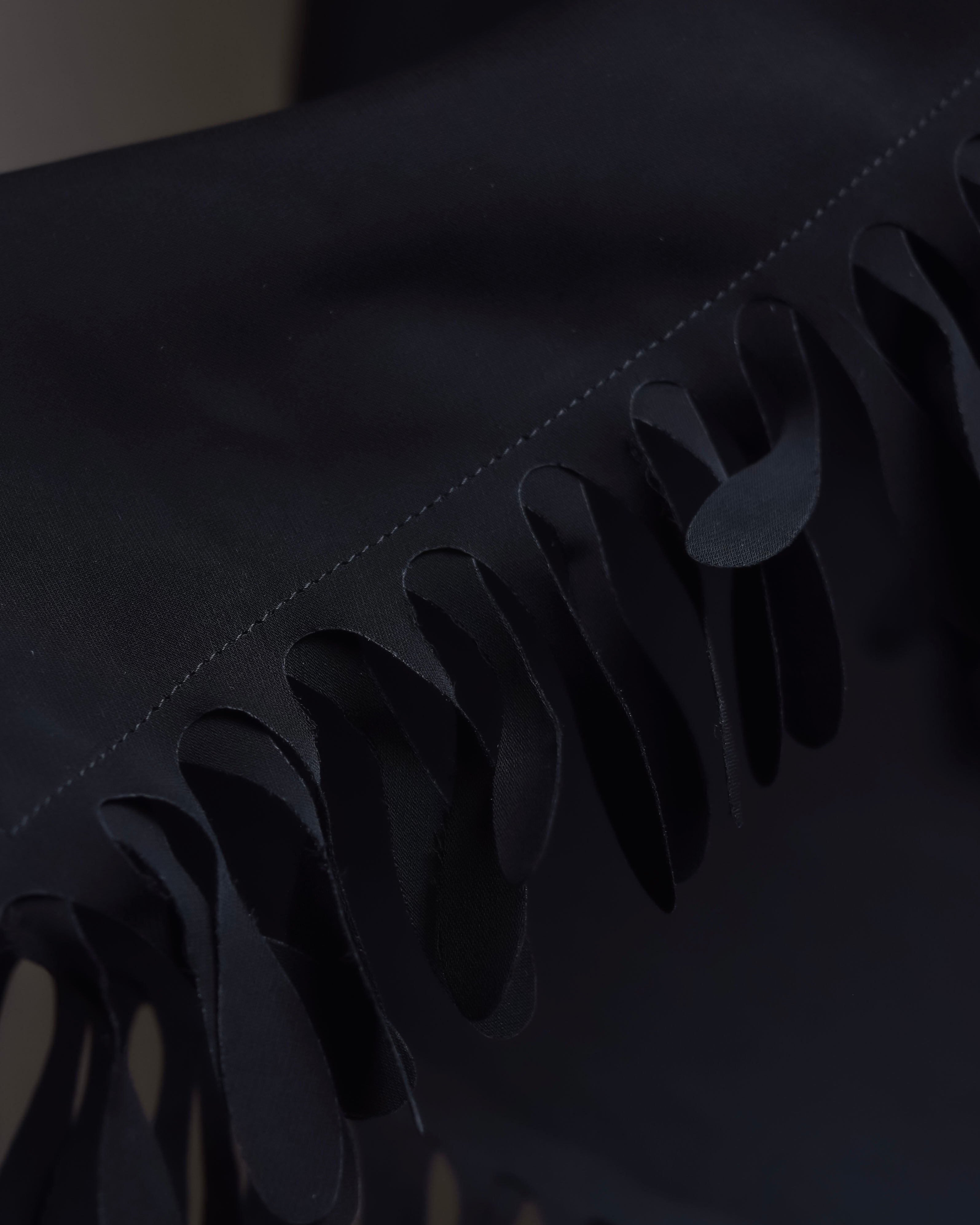 "ISSEY MIYAKE" Organic cutout fringe wrap skirt