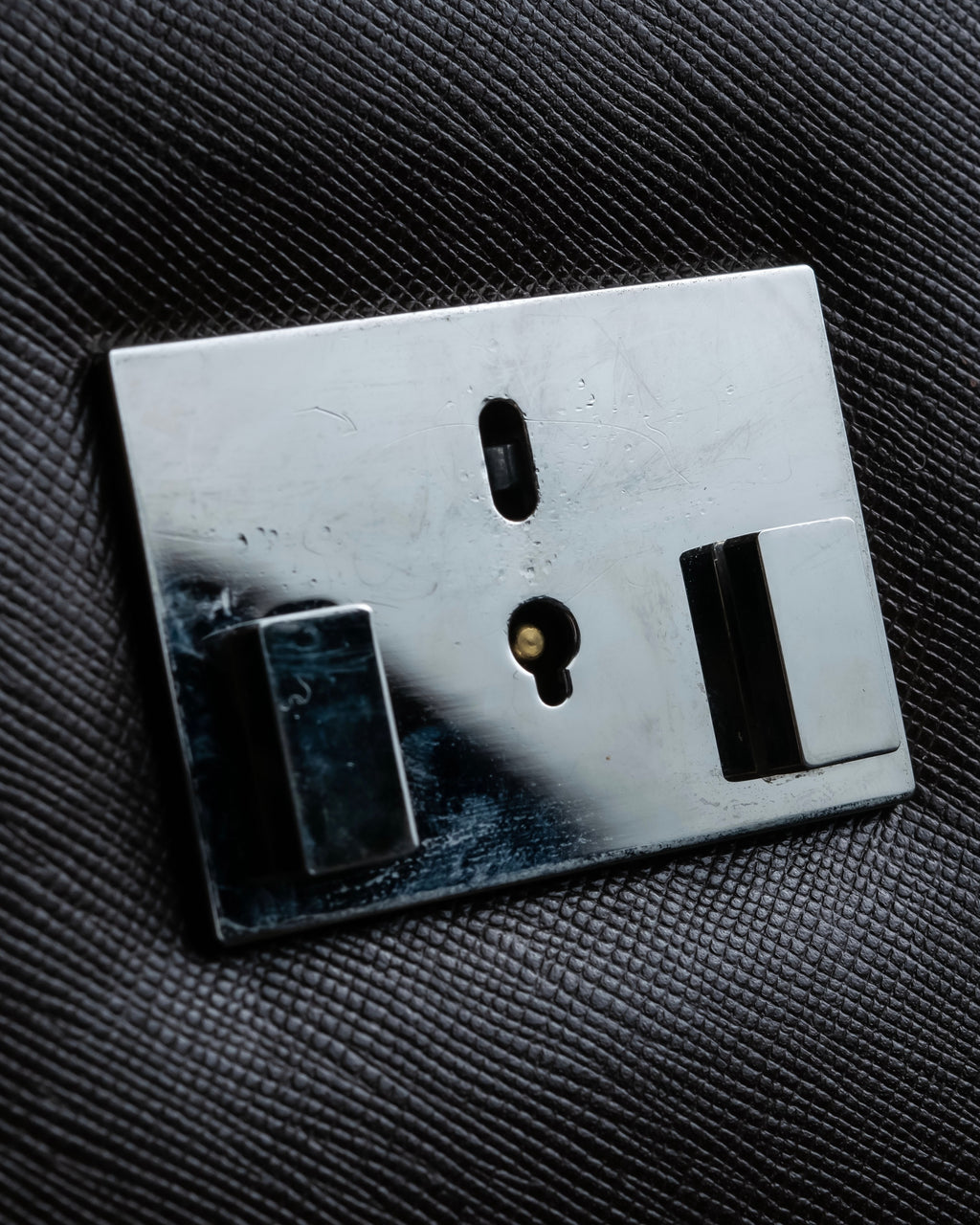 "BURBERRY" Metal belt design embossed PVC briefcase