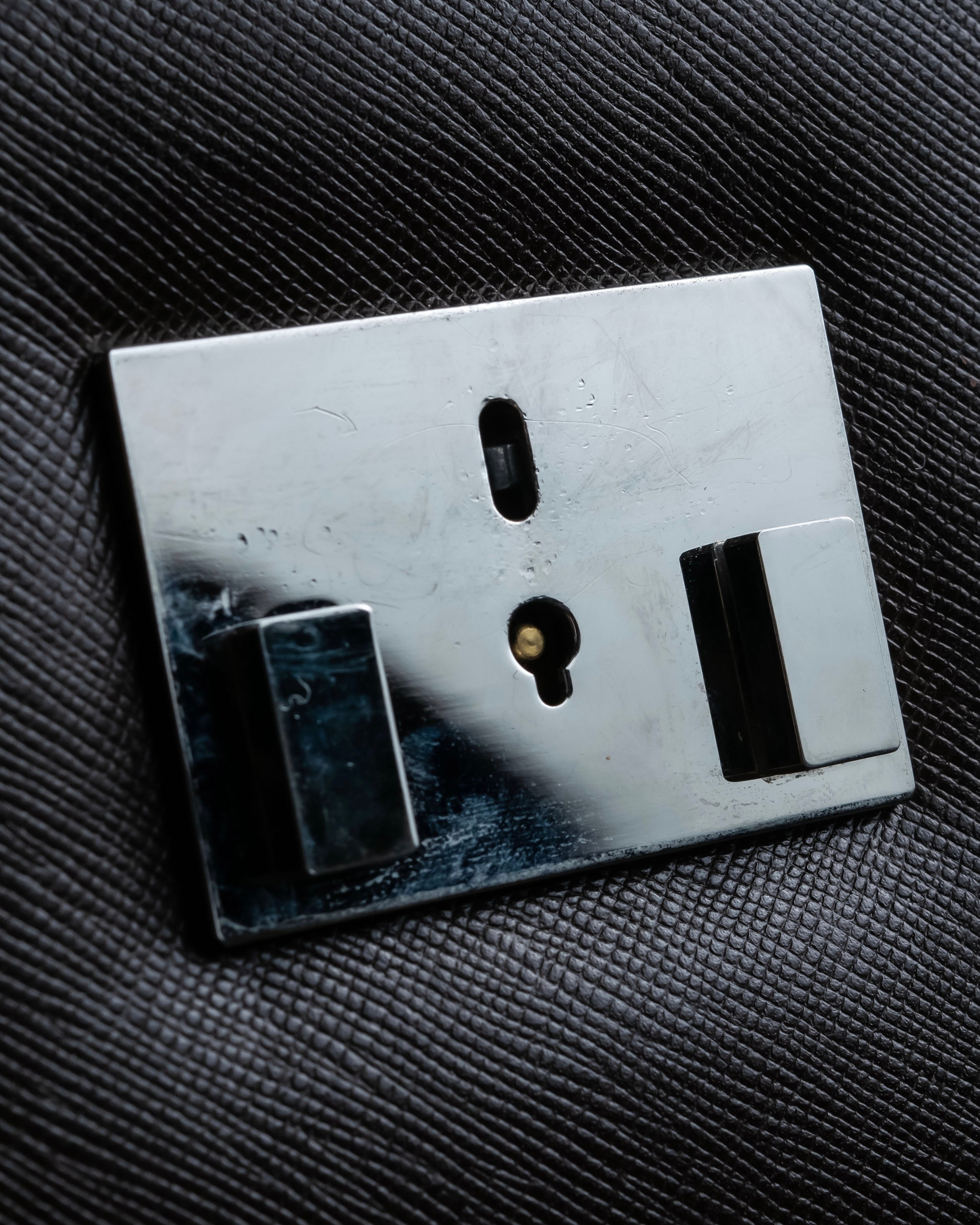 "BURBERRY" Metal belt design embossed PVC briefcase