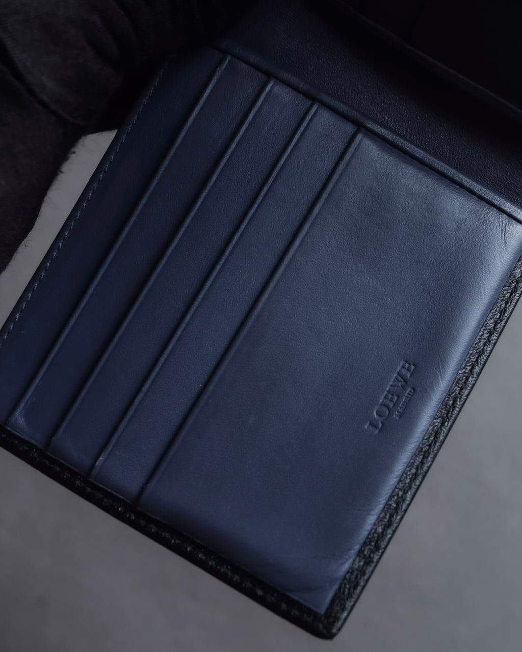 "LOEWE" Logo engraved bi-fold leather wallet