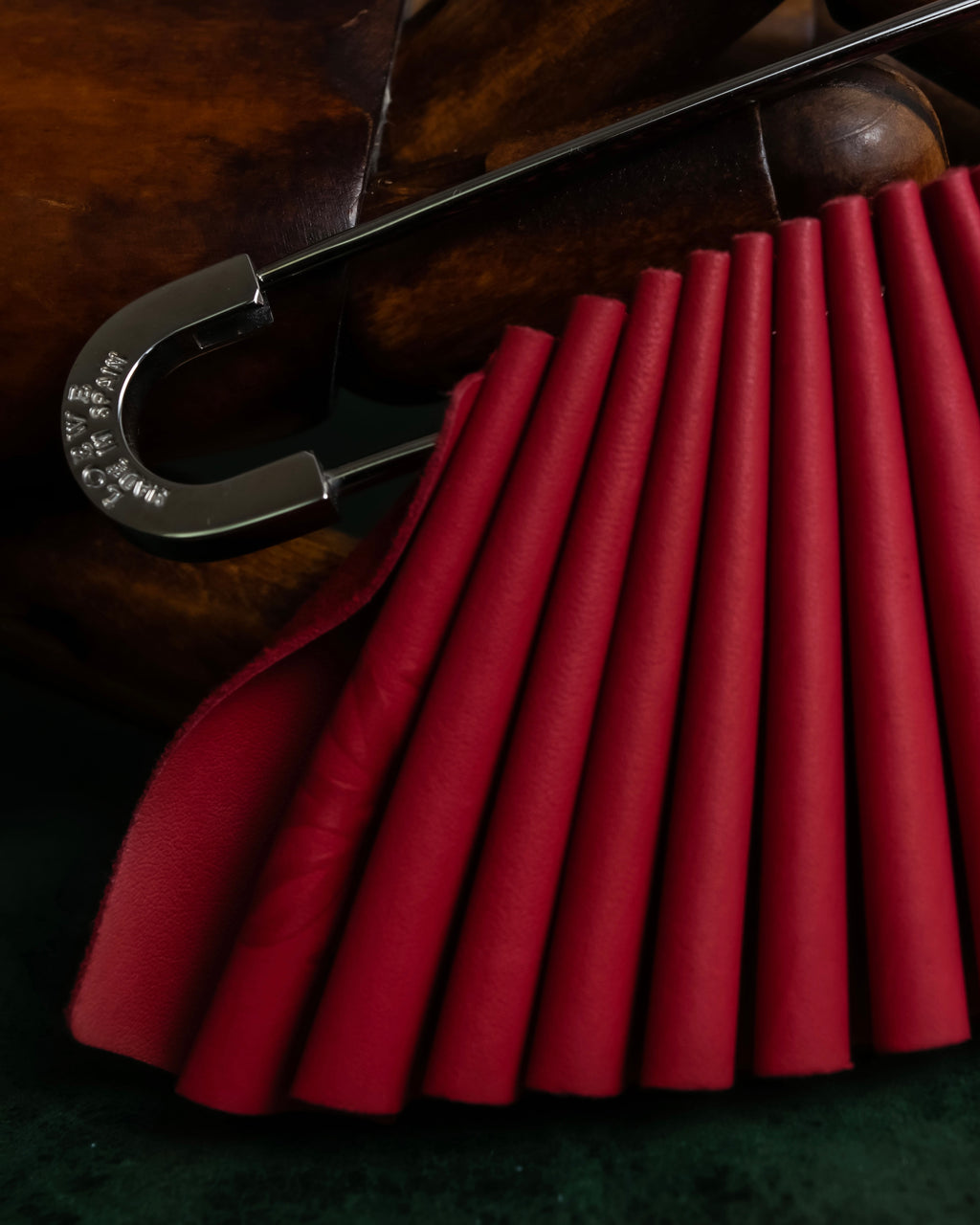 "LOEWE"  Red pleated motif safety pin brooch