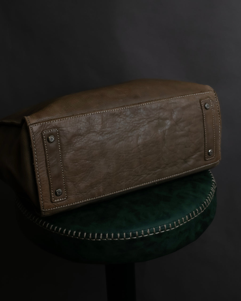 "Mademoiselle Accessories"
 Silver parts design leather one handle bag