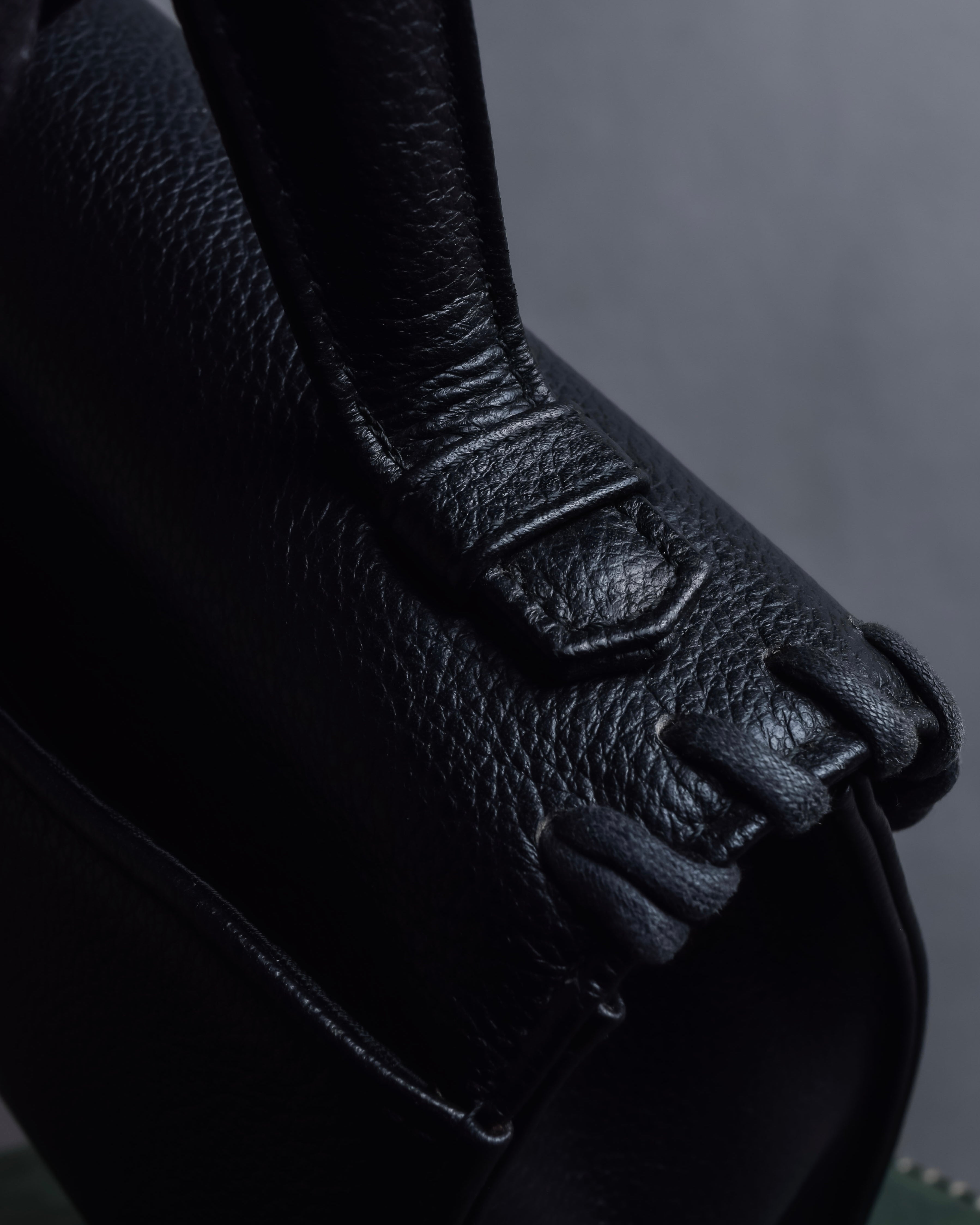 "YVES SAINT LAURENT" Hand stitched design trapezoid leather bag