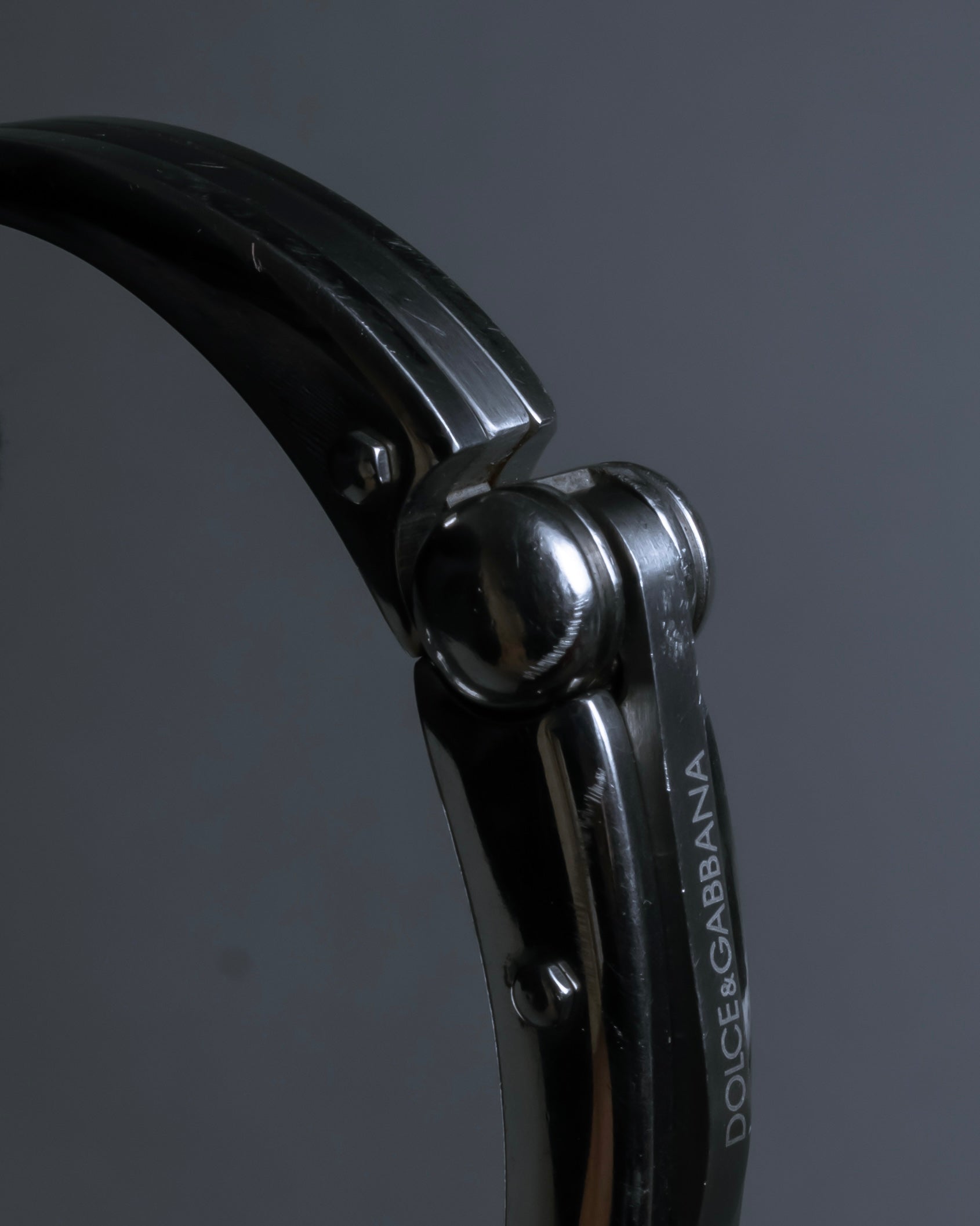 "Dolce & Gabbana" Curved rivet design silver metal bracelet