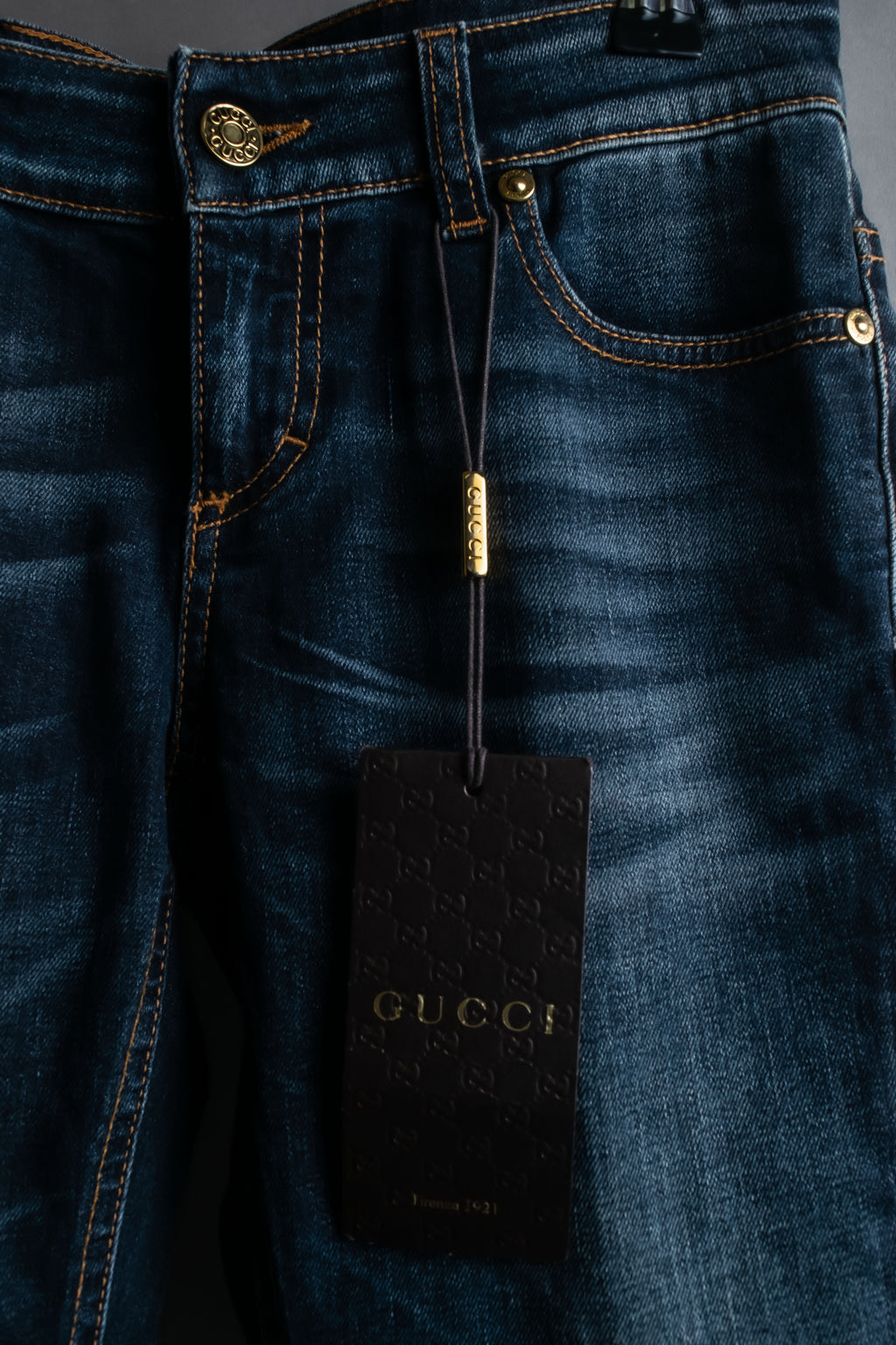 Pantalones de mezclilla con lavado de libélula de GUCCI