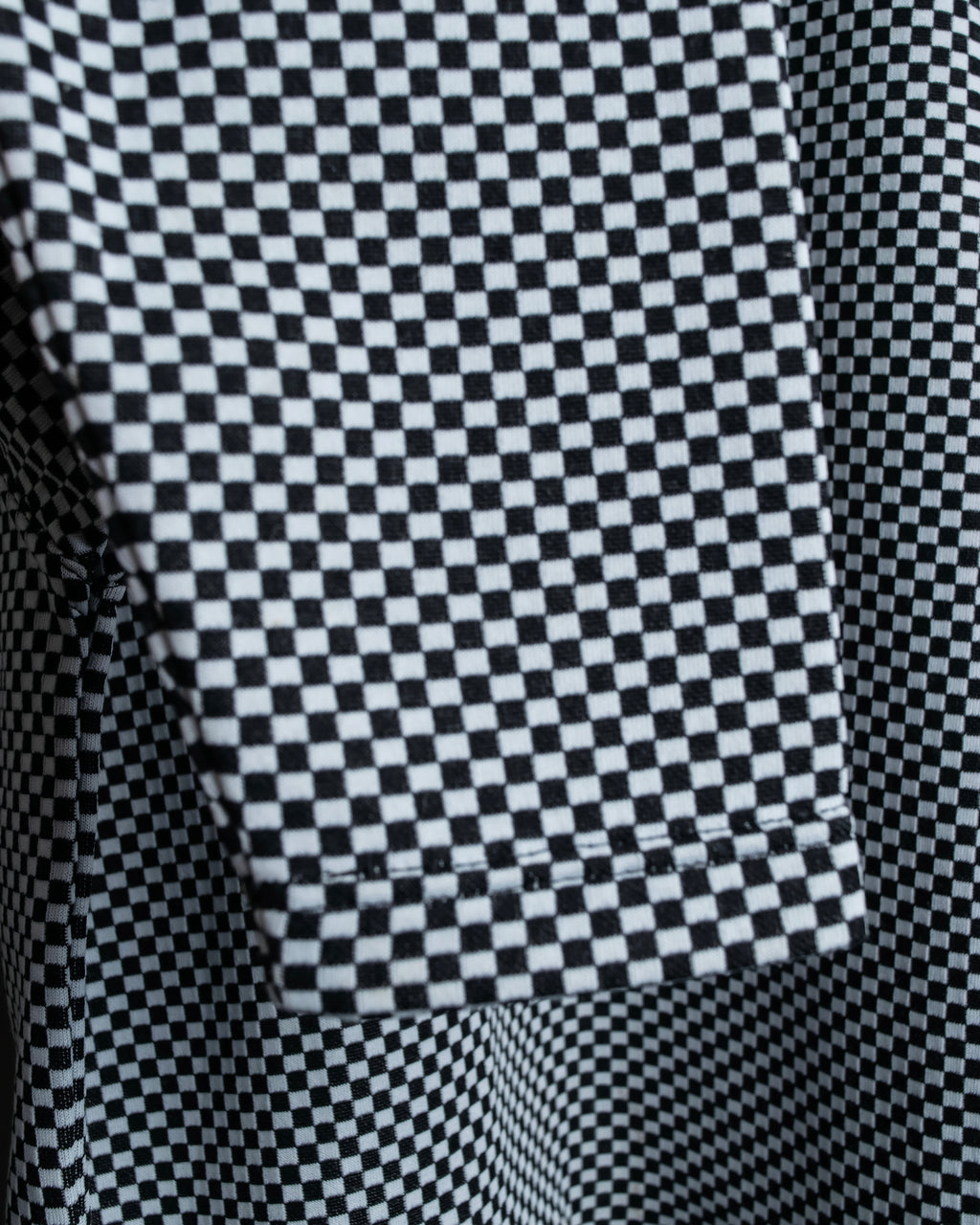 “VERSACE” checkered pattern zip pocket pull over