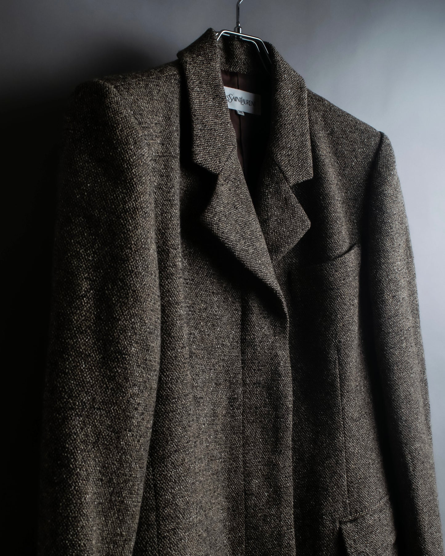 "Yves Saint Laurent Rive Gauche"
Fly front tweed chester coat